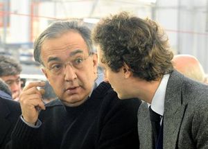 Sergio Marchionne con John Elkann. Foto Ansa. 