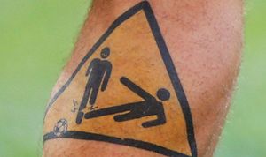Il polpaccio tatuato di De Rossi.