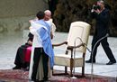 Pope Francis embraces8
