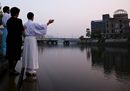 Shinto priests pray