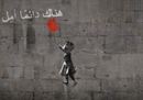 Siria, la ragazza con il palloncino rosso. L'animazione di Banksy contro la guerra