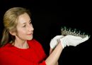 1. A Historic Royal Palaces conservator prepares Queen Victoria's Diamond and Emerald Diadem for display at Kensington Palace. (c) Historic Royal Palaces.jpg