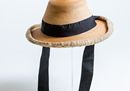 Straw hat worn by Queen Victoria, with cream gauze, black silk ties and lined with silk (c) Historic Royal Palaces.jpg
