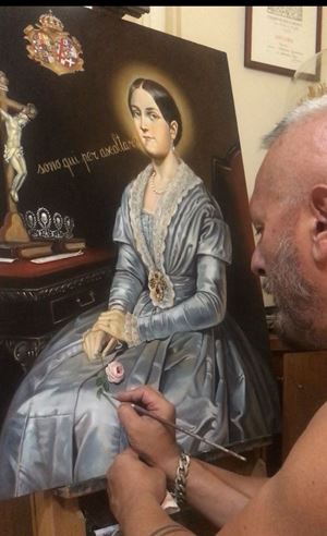 Il pittore Gioacchino Vellutino all'opera. 