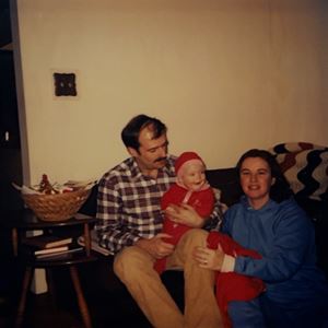 Dana child with her father and mother