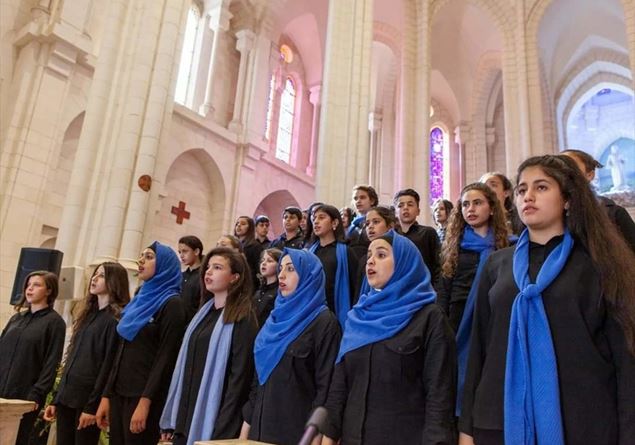 The chorus of Palestinian boys arrives on tour in Italy to sing the exile